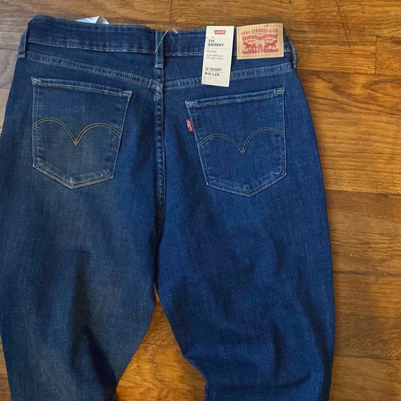 Levi's® 711 Destructed Mid Rise Skinny Jeans - Picture 6 of 9